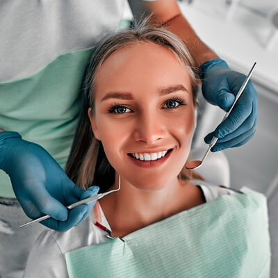 woman-smiling-before-checkup-sq